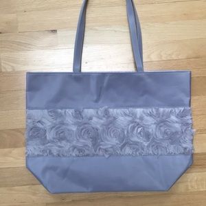 - Gray never used tote bag